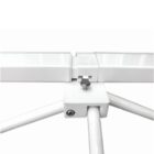 Close-up of a white metal bracket with a screw connecting two rectangular beams. The structure is supported by angled legs, likely part of a frame or stand mechanism.