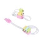 Colorful, toy-like USB cables with interlocking block-style connectors. The cables are white, featuring pastel blocks in pink, green, and yellow at the ends, resembling toy bricks.