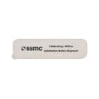 A rectangular beige commemorative plaque with rounded corners featuring the logo ssmc and the text Celebrating 1 Million Automotive Wafers Shipment.