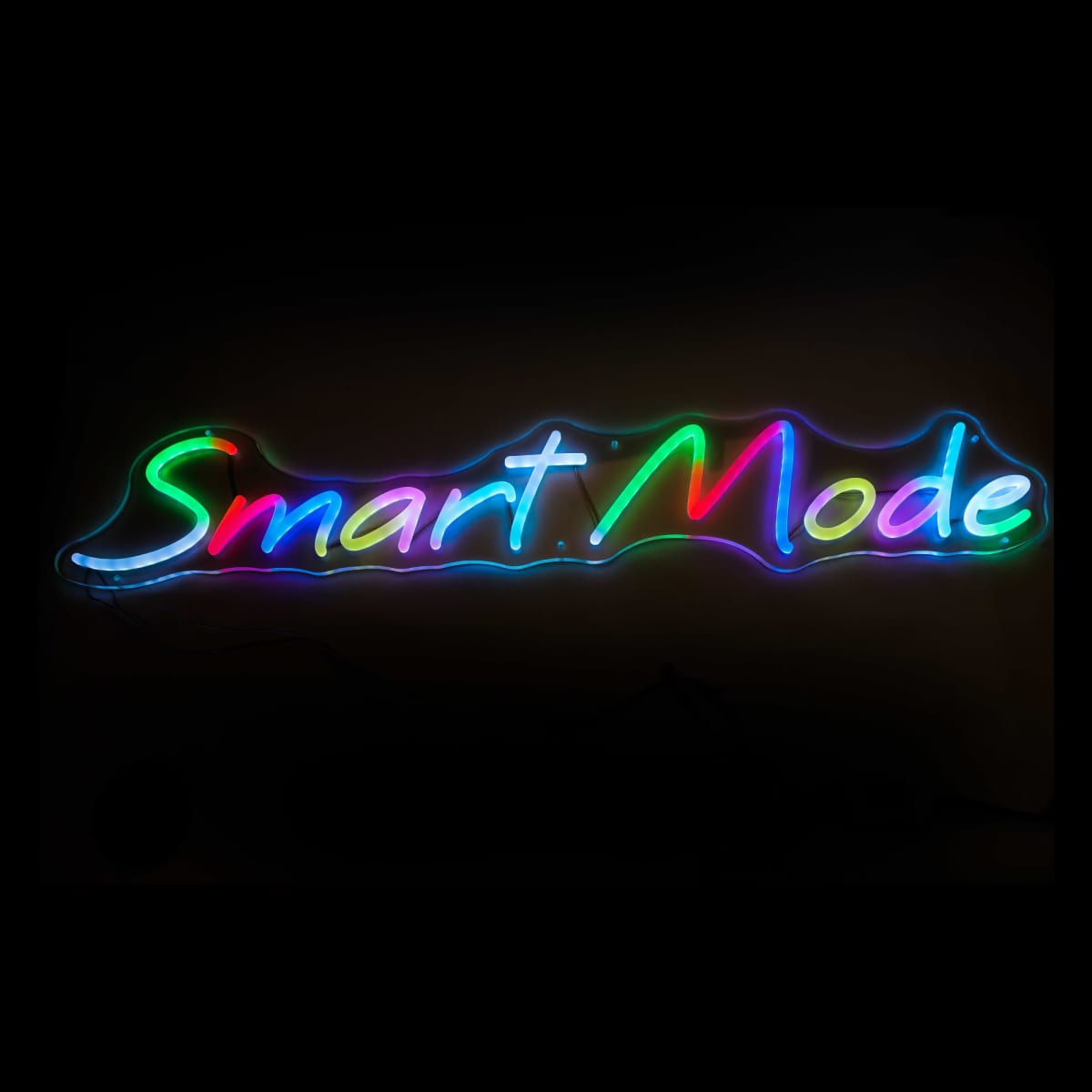 Colorful neon sign displaying the words Smart Mode in a flowing script. The letters are illuminated in a gradient of red, green, blue, and pink, set against a dark background.