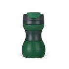 A green reusable travel tumbler with a matte finish, featuring a curvy design and a closed lid.