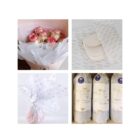 Four images in a grid: Top left shows pink roses wrapped in paper; top right displays a folded cream-colored item on patterned fabric; bottom left has a round gift wrapped in star-patterned paper; bottom right shows three bottles wrapped in branded paper.