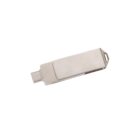A silver metallic USB flash drive with a sleek, rectangular design. It has a small loop at one end for attaching to a keychain. The USB connector is visible on one end. The surface appears smooth and shiny.
