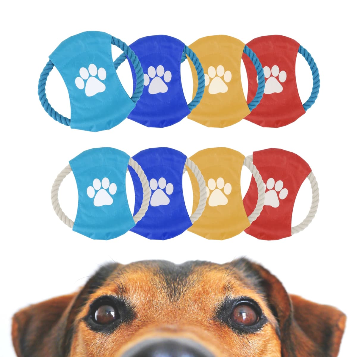 A dogs face appears at the bottom of the image, looking up at seven colorful dog toys above. The toys are blue, yellow, and red, each printed with a white paw print and having rope handles on the sides.