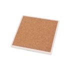 A square cork coaster with a white border, slightly tilted, displayed on a white background.