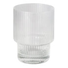 The Alva Glass Tumblers Ribbed have transparent glass with a vertical ribbed texture, a cylindrical shape, and thicker bases for stability, boasting a simple modern design that enhances clarity and elegance.