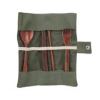 A set of wooden utensils, including a spoon, chopsticks, and a fork, neatly tucked into a green fabric holder with a button closure.