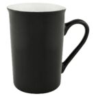 A matte black ceramic mug with a glossy white interior and a curved handle, shown from a side angle.