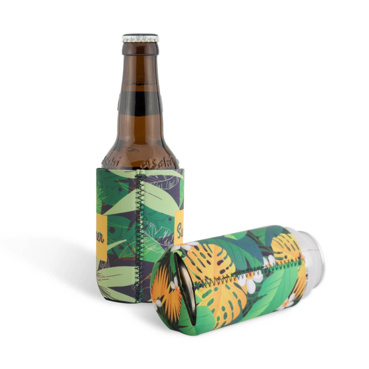 Two drink bottles with colorful, tropical-patterned neoprene sleeves. One bottle is upright, and the other is lying on its side. The design features green leaves and yellow accents on a white and green background.