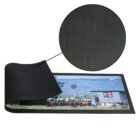 A printed mat with a close-up showing its textured black rubber underside.