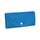 A blue folding bag with a rounded flap and a white button closure, designed for compact storage.