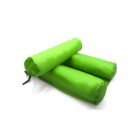 A vibrant green inflatable lounger with two cylindrical compartments, partially folded on a white background.