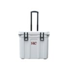 White rectangular cooler with black wheels and a retractable handle, featuring a hinged lid and two black latches. It has a red logo on the front side.