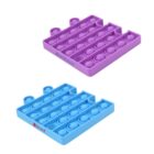 Two square pop-it fidget toys with bubble patterns. The top one is purple with the text BONBONS, and the bottom one is blue with the text board. Each has three tab-like protrusions on one side.