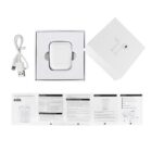 Wireless earbuds in a white box with a charging case, USB cable, and user manuals displayed.