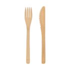 A set of bamboo utensils consisting of a fork and a serrated knife, displayed against a white background. The utensils have a natural wood grain and smooth finish.