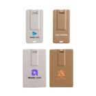Four rectangular card holders with clips. Two are beige, one with a blue logo and another with a purple logo. Two are brown, one with MULTIMEDIA written and another with an orange star logo.