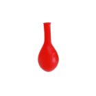 A red rubber bulb syringe isolated on a white background.