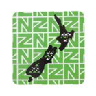 A square coaster with a green geometric pattern featuring the letters N and Z. The outline of New Zealand is in black with white geometric details, centered on the coaster.