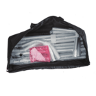 A black bag is open, revealing various disassembled metal and plastic pipes wrapped in plastic. Theres a pink bag among the components, indicating a set of materials possibly for assembly.