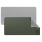A dual-sided desk mat featuring a dark green surface on one side and a light gray surface on the other. The mat displays a subtle logo and Lorem Ipsum text in the corner. One corner is flipped to show the reverse side.