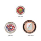Three circular metallic tokens are shown. The top has red text and a multicolored emblem, diameter 3.0 cm. The bottom left features fire rescue symbols, diameter 3.8 cm. The bottom right displays a horse motif, diameter 4.45 cm.