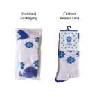 Two pairs of folded socks with blue floral patterns. One is in plastic with Standard packaging above, the other hangs with a custom header card labeled Indigo Flower. Both socks have similar blue and white designs.