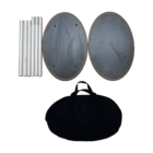 Portable table parts including two oval black panels, several aluminum legs, and a black carrying bag are arranged on a plain white background.