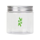 Clear cylindrical jar with a silver screw-on lid. The jar features a green abstract logo in the center. The jar is empty and set against a white background.