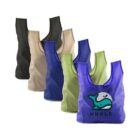 Five reusable shopping bags are arranged in a row, each in different colors: black, beige, blue, green, and purple. The purple bag features a cartoon whale logo with the word WHALE printed on it.
