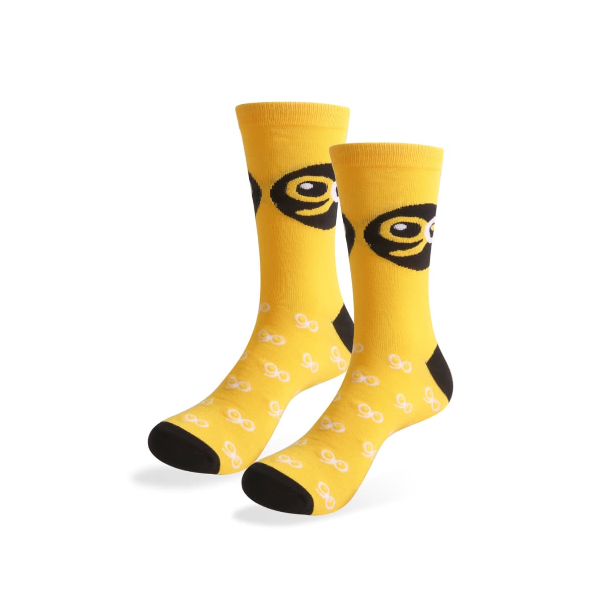 Yellow socks featuring a black and white eye design at the top and small white infinity symbols scattered throughout. The toes and heels are black.