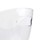 Close-up of a transparent, curved plastic pitcher with a handle, showcasing its sleek and modern design against a white background.