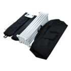 Folded white event tent frame with two black carrying bags and instruction manual. The frame is compact and segmented, and the bags are open, ready for packing.
