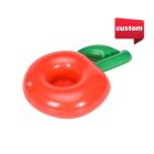 A red inflatable pool float shaped like an apple with a green leaf attached. A small red speech bubble at the top right corner contains the word custom.