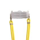 A clear plastic connector with two clips attached to bright yellow cords. The connector has a slightly cloudy finish and patterned interior, and the yellow cords appear to be made from a thick nylon material.