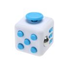 A white fidget cube with one blue button, four blue circular buttons, a blue joystick, a silver rolling ball, and three blue dials. The cube is designed for stress relief and fun tactile interaction.
