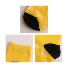 Three close-up images of a yellow sock with white patterns. The sock has black at the toe and heel. The patterns are small and circular. The bottom left image shows the socks opening with an elastic band.