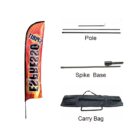 A tall, feather-shaped flag with Espresso in bold red letters and Spirit above. Includes a pole, a spike base, and a black carry bag for assembly.