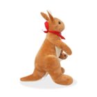 A plush kangaroo toy stands upright with a smaller kangaroo in its pouch. Both are light brown with beige bellies. The larger kangaroo wears a red bandana around its neck.