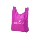 A pink reusable shopping bag with the bioisland logo in white on the front, featuring a small butterfly design. The bag is shown against a plain white background.