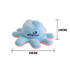 A light blue plush octopus toy with pink undersides. The text 47 Street is printed on its body. The toy measures 20 cm wide and 10 cm tall.