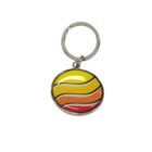 A keychain featuring a round, colorful enamel charm with wavy stripes in yellow, orange, and red hues.