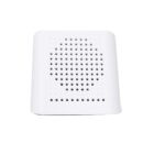 A white grater with a rectangular shape, featuring numerous small, circular holes for grating. It is set against a plain white background.
