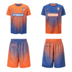 Two sports kits are displayed. Both have shirts and shorts with gradient designs. The left kit is orange and blue with blue at the top, the right is blue and orange with orange at the top. Both have logos and the word Sponsor on the shirts.