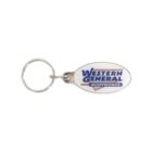A keychain with an oval-shaped tag attached. The tag is white with the text Western General Bodyworks in blue and red lettering.