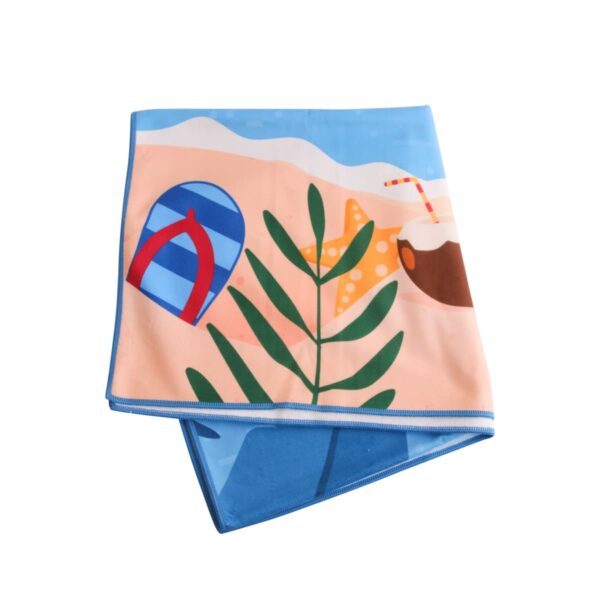 Folded beach-themed towel with colorful illustrations including a flip-flop, starfish, coconut drink with a straw, and a leafy plant. The background features sandy and ocean blue colors.