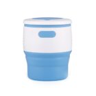 A blue and white collapsible silicone coffee cup with a lid. The design is compact, with a grooved section on the white part, and a solid blue base that can be expanded. The cup appears portable and minimalist.