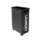 Black laundry cart on wheels with LAUNDRY written in white on the side.