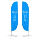 Two blue windsail flags each with a metal stand. The flags display Windsail Flag Convex with labels Side A and Side B. The text includes Medium Flag Size, 2x8.6 (60 x 260cm), and CoverActionsPremium.com.