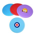 Four colorful frisbees are shown: a light blue one with a target design, a red one, a purple one with a dog face graphic, and another plain light blue one.